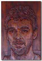 Retrato de Pau Gasol tallado en
           madera