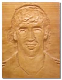Raúl González Blanco tallado en madera - 
          Ex jugador del Real Madrid tallado en madera